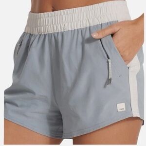 Vuori Women's Athletic Shorts in Light Blue and White